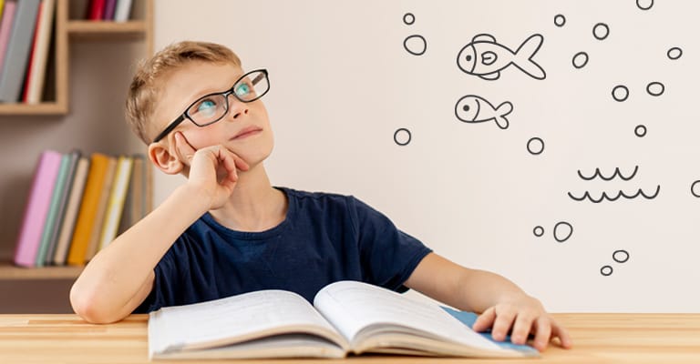 Children holding hands and smiling